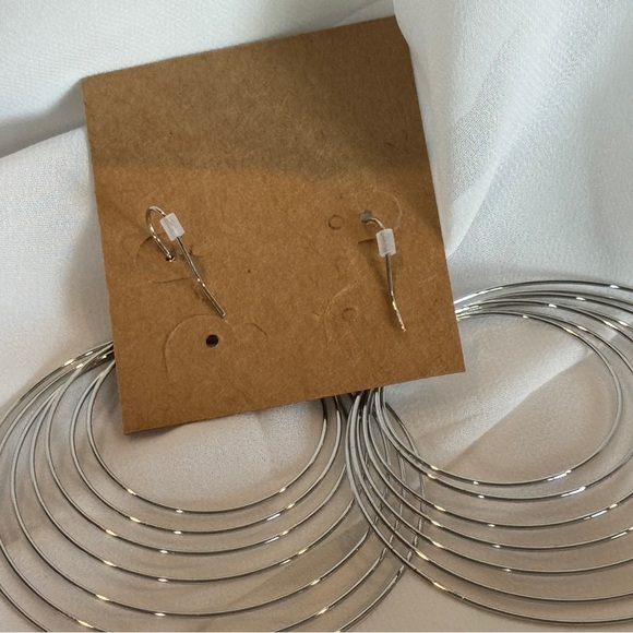 Plunder Shiny Silver Layered Multi-Hoop Earrings - Picture 4 of 4